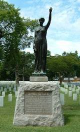 monument of a bronze female figure, dedicated to Civil War soldiers